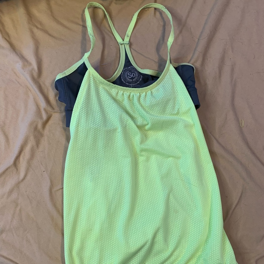 a little wear & tear, wore quite a few times , built in sports bra